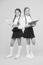 School friendship. Girl with copy books or workbooks. Study together. Kids cute students. Schoolgirls best friends Royalty Free Stock Photo