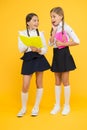 School friendship. Girl with copy books or workbooks. Study together. Knowledge day. School day. Kids cute students Royalty Free Stock Photo