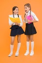 School friendship. Girl with copy books or workbooks. Study together. Knowledge day. School day. Kids cute students Royalty Free Stock Photo