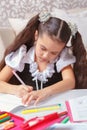 School girl doing writing