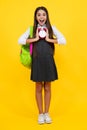 School girl and education concept. Back to school. Schoolchild, teenage student girl with clock alarm, time to study Royalty Free Stock Photo