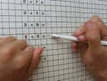 School girl with eraser and math Royalty Free Stock Photo