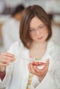 School girl experimenting with chemical in laboratory at school