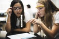 School girl friends learning science in the lab classroom Royalty Free Stock Photo