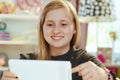 School girl having distance education at home in sunny day Royalty Free Stock Photo