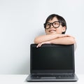 School girl with laptop thinking Royalty Free Stock Photo