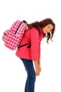 School girl with overweight backpack