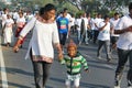 School girl running at Hyderabad 10K Run Event, India