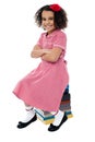 School girl sitting on stack of books Royalty Free Stock Photo