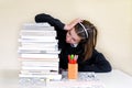 School girl with stack of homework Royalty Free Stock Photo