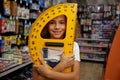 School girl student holding huge protractor ruler stationery in hands Royalty Free Stock Photo