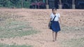 School girl walking, Bakong Temple, Cambodia