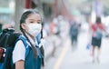 School Girl wearing mouth mask against air smog pollution in Bangkok city, Thailand Royalty Free Stock Photo