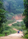 School girls going from home in a rural village to school in a morning