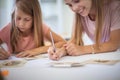 School girls taking exam in classroom Royalty Free Stock Photo