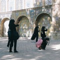 Iranian girls taking pictures of Golestan palace in Teheran
