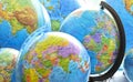 School globes of the planet Earth with a world map. Back to school.