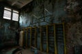 School gymnasium in the city of Pripyat in Ukraine. Emptiness. Dampness. Exclusion Zone. Nuclear danger. Ghost City Royalty Free Stock Photo