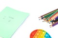 School items. Notebooks, pencils for drawing and silicone toy popit on  white background. Concept of education, back to school, Royalty Free Stock Photo