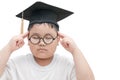 School kid graduate thinking with graduation cap isolated Royalty Free Stock Photo