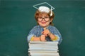 School kids against green chalkboard. Elementary school and education. Talented child. First school day. Kids gets ready Royalty Free Stock Photo