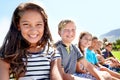 School kids, friends and portrait with smile in garden on academy trip for adventure, learning or summer. Girls, boys Royalty Free Stock Photo