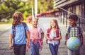 School kids going to school together Cheerfully kids Royalty Free Stock Photo