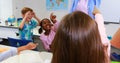 School kids irritating teacher in classroom