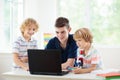 School kids with microscope. Science class Royalty Free Stock Photo