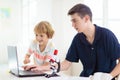 School kids with microscope. Science class Royalty Free Stock Photo