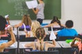 school kids with paper planes in classroom Royalty Free Stock Photo