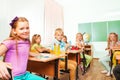 School kids sitting at studying desks in class Royalty Free Stock Photo