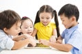 School kids studying with tablet