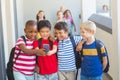 School kids taking selfie on mobile phone