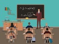 School lesson. Little kids pupil students with teacher. Classroom with blackboard. Royalty Free Stock Photo