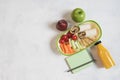 School lunch box with sandwich, vegetables, water, fruits Healthy eating habits concept - background layout with free text space. Royalty Free Stock Photo