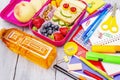 School lunch box with school supplies Royalty Free Stock Photo