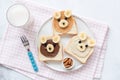 School lunch or breakfast for kids. Peanut butter banana toast with animal face Royalty Free Stock Photo