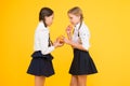 School lunch. Vitamin nutrition. Fresh fruit school. Girls kids school uniform drinking orange fruit fresh juice Royalty Free Stock Photo