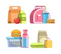 School lunches in special containers and inside pink bag