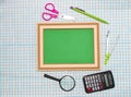 school math background, vintage school green board as copy space, school supplies around the board