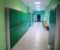 School metal boxes of green color in the corridor
