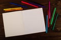 School notebook with lines and markers on the table. School supplies. Copy space Royalty Free Stock Photo