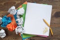 School notebooks and crumpled paper balls Royalty Free Stock Photo