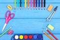 School and office accessories on blue boards, back to school concept, copy space for text Royalty Free Stock Photo