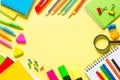 School and office sstationery on yellow background.