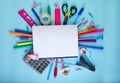 School office supplies on a blue background with copy space. Back to school Royalty Free Stock Photo