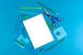 School office supplies on blue background Royalty Free Stock Photo