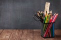 School and office supplies on classroom table Royalty Free Stock Photo