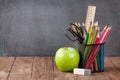 School and office supplies on classroom table Royalty Free Stock Photo